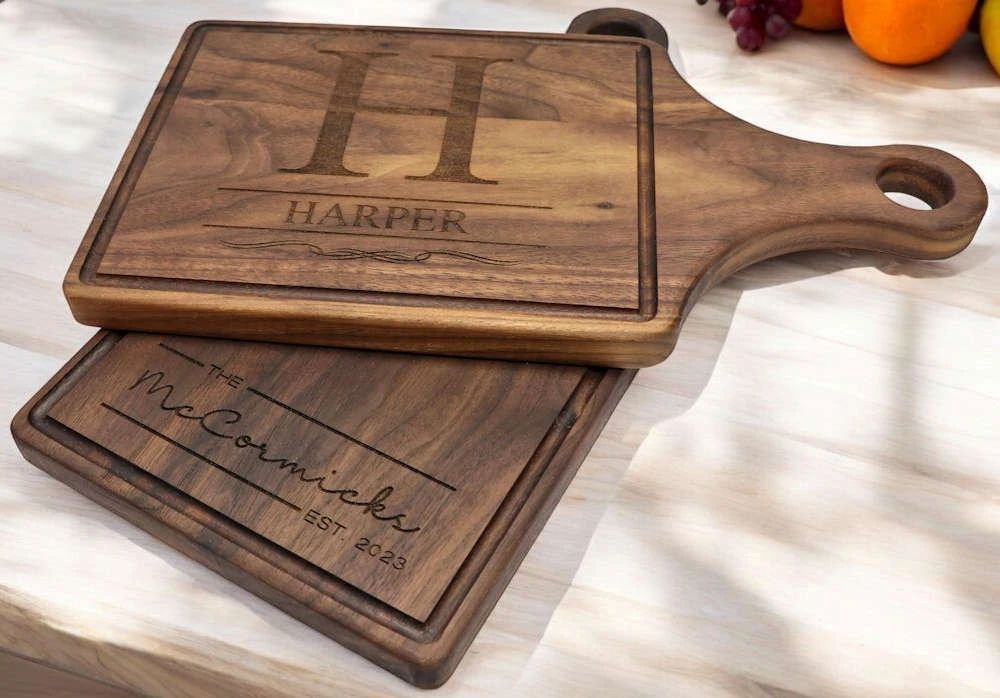 A laser-engraved walnut cutting board, made by Cool Beams in Georgetown, Texas.